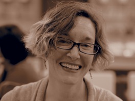 Michele Mason headshot on sepia colors